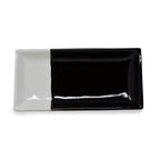 Rectangular ceramic plate with black and white two-tone design 
