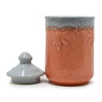 Ceramic storage jar with lid removed