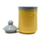 Storage jar styled on kitchen counter