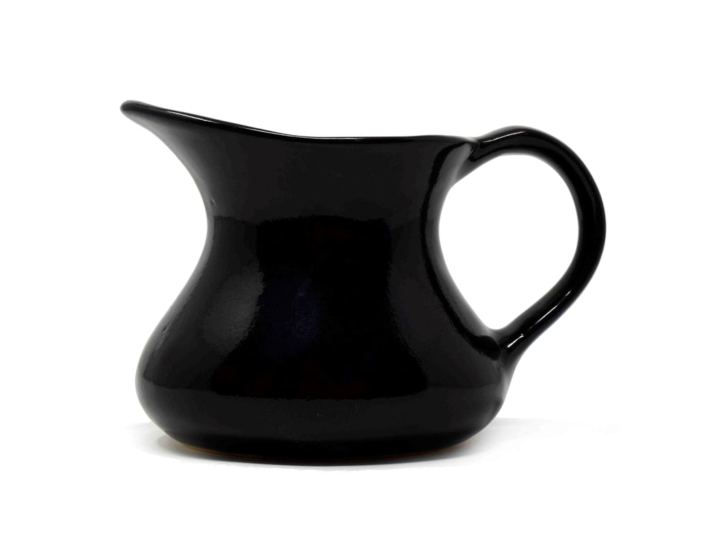 tea set milk jug